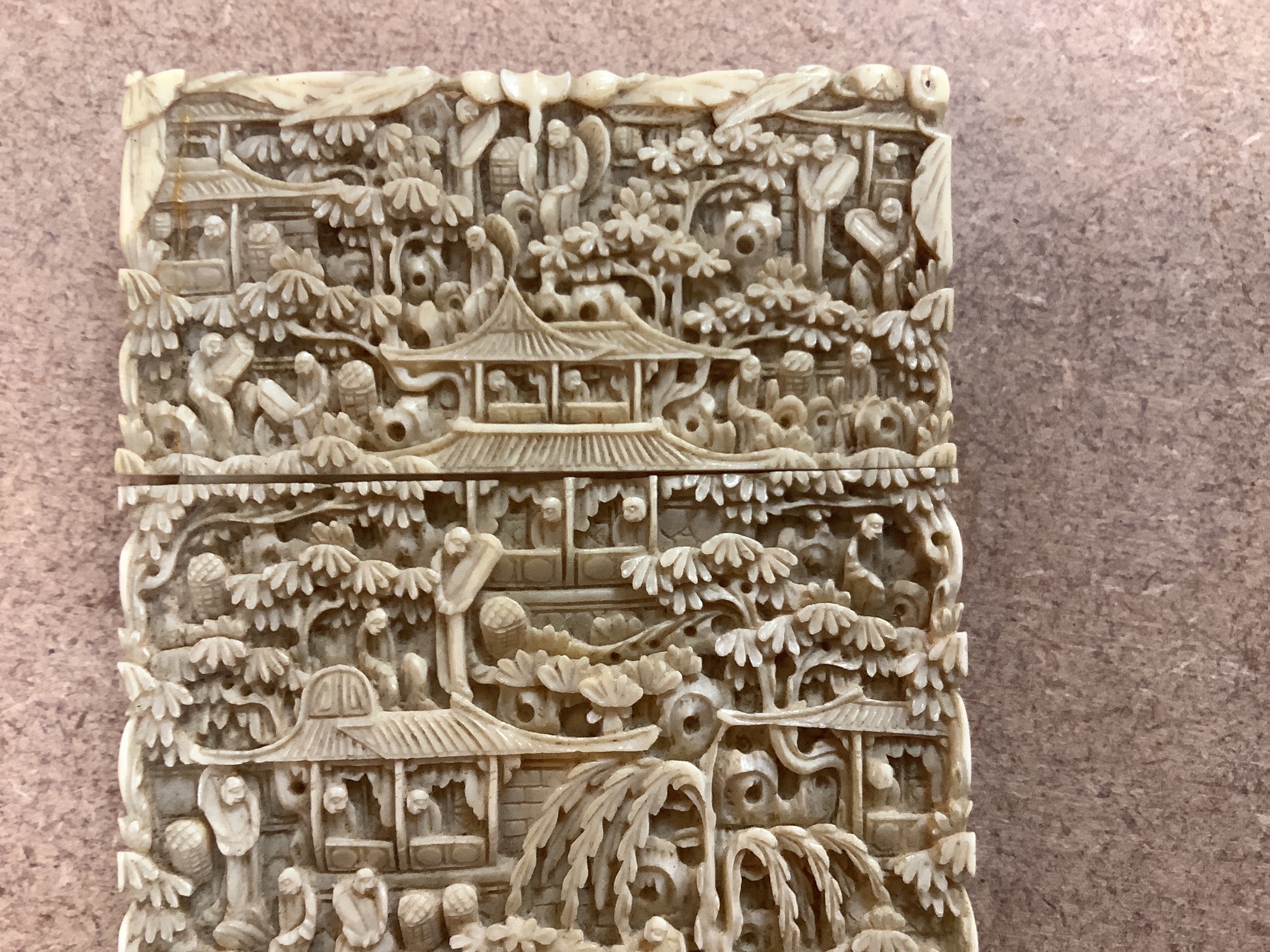 A Chinese Cantonese carved ivory card case, 11.5cm